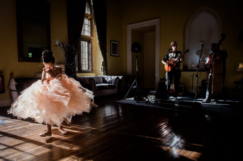 Bridesmaid dancing at Clearwell Castle wedding